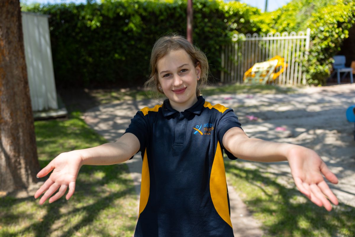 Aspect Riverina School student with open arms