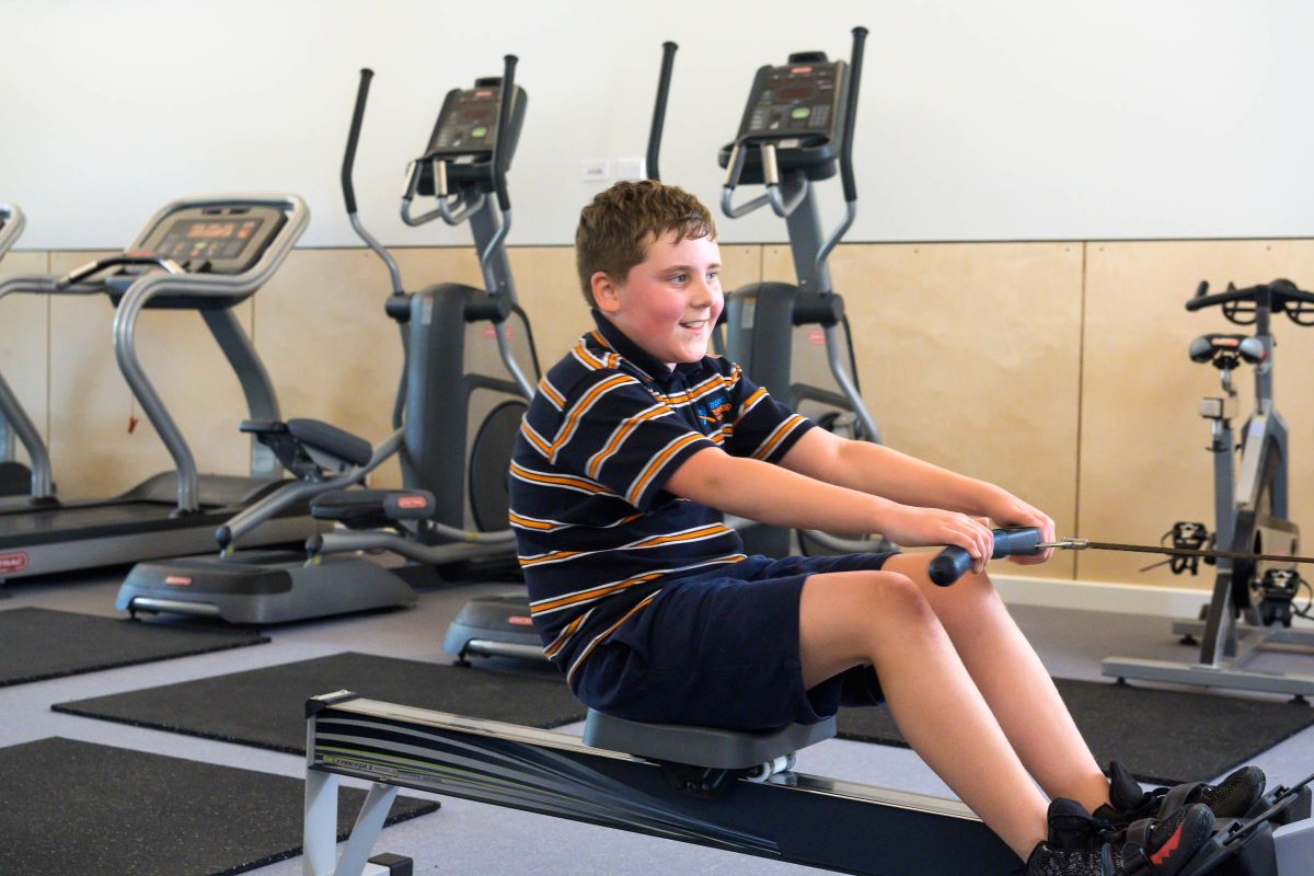 Student using the new gym equipment at Aspect Treetop School
